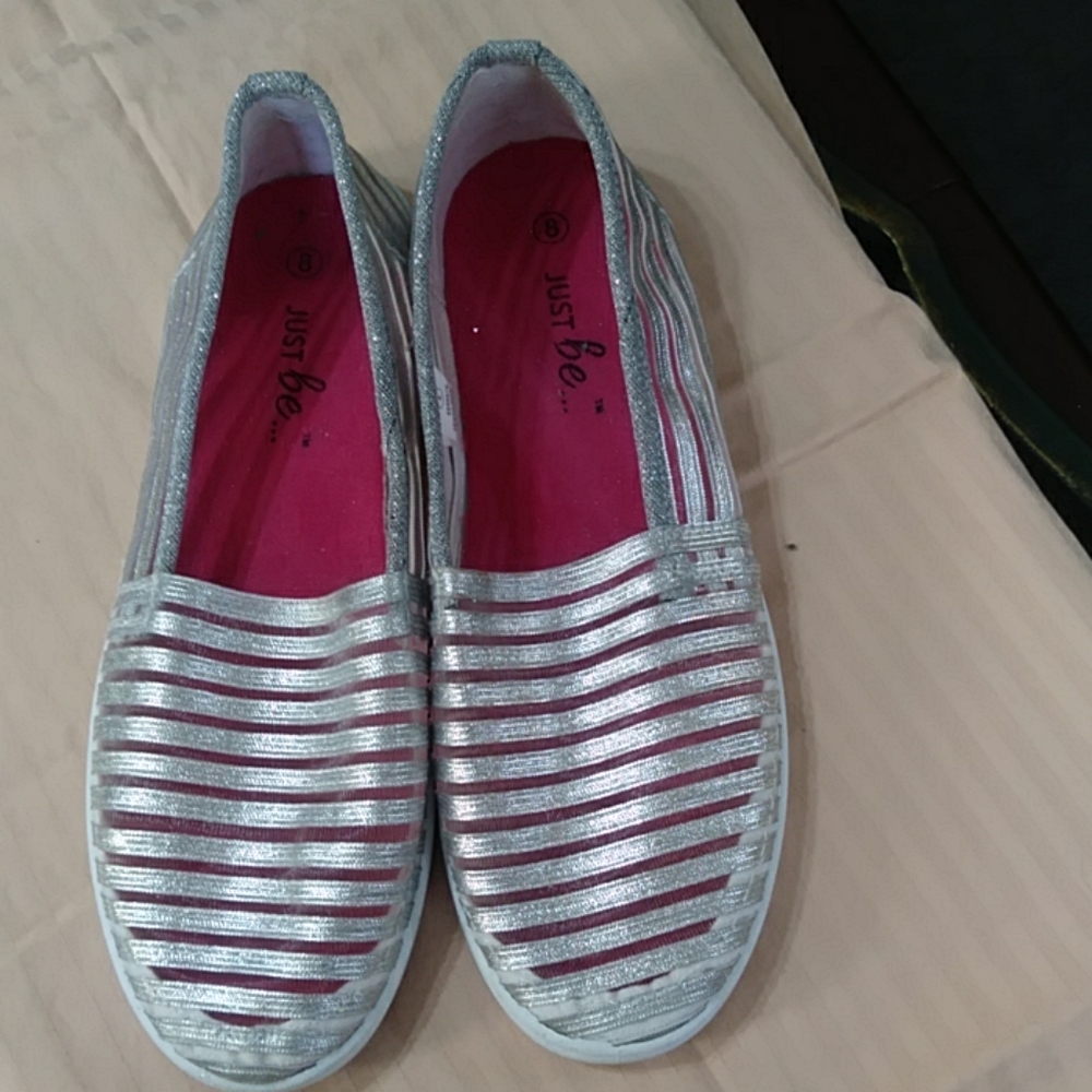 Silver glitter flat shoes.